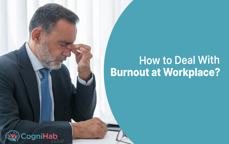 An office employe is thinking on How to Deal With Burnout at Workplace